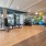 Large fitness center with large windows and plenty of equipment