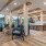 Spacious lounge with large windows and ample seating 